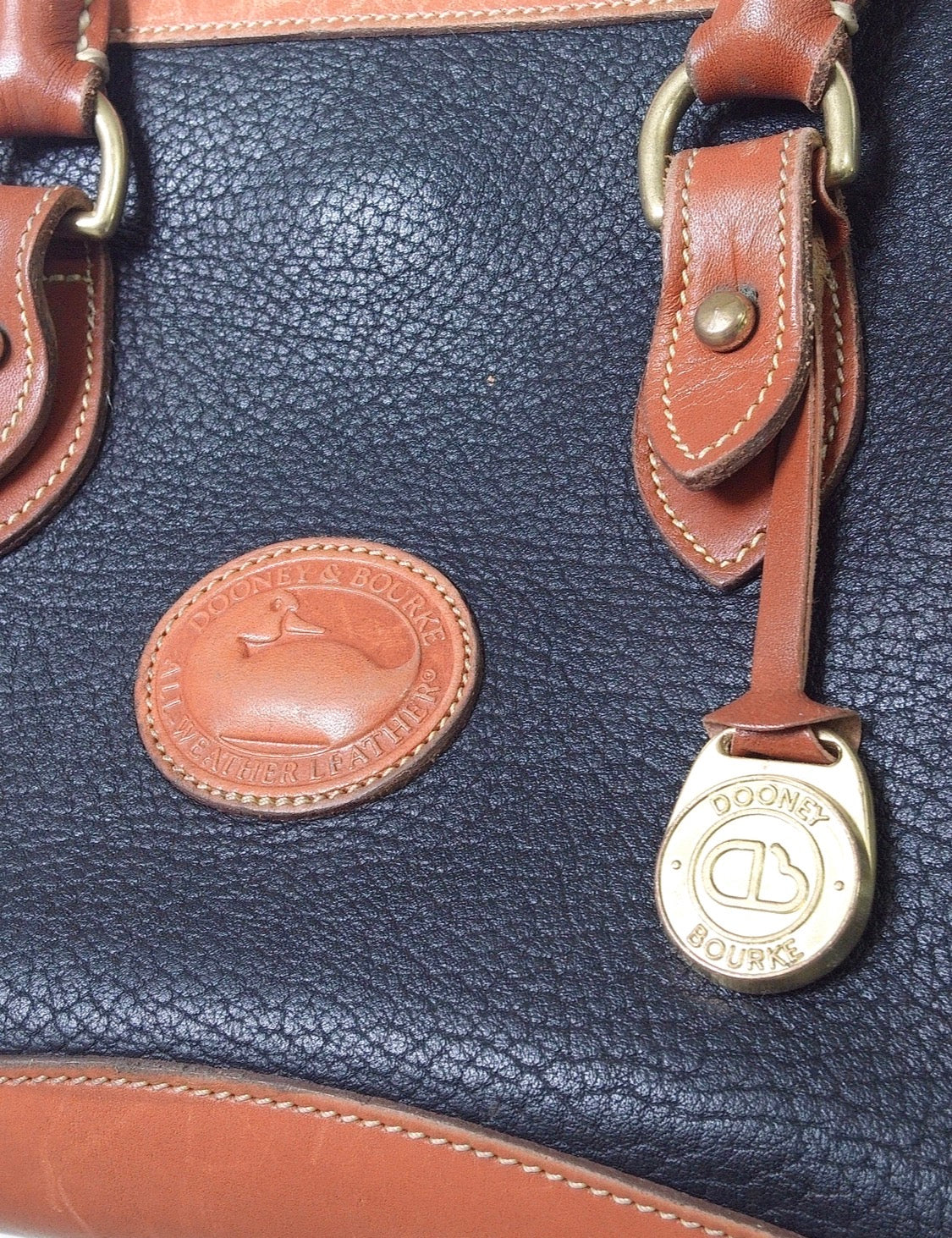 Pre Owned Dooney & Bourke All Weather Leather Satchel | Black & British Tan | Duck Fob (Vintage)