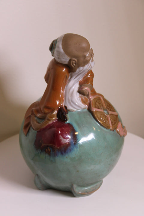 Celadon Glazed Laughing Elder Figure