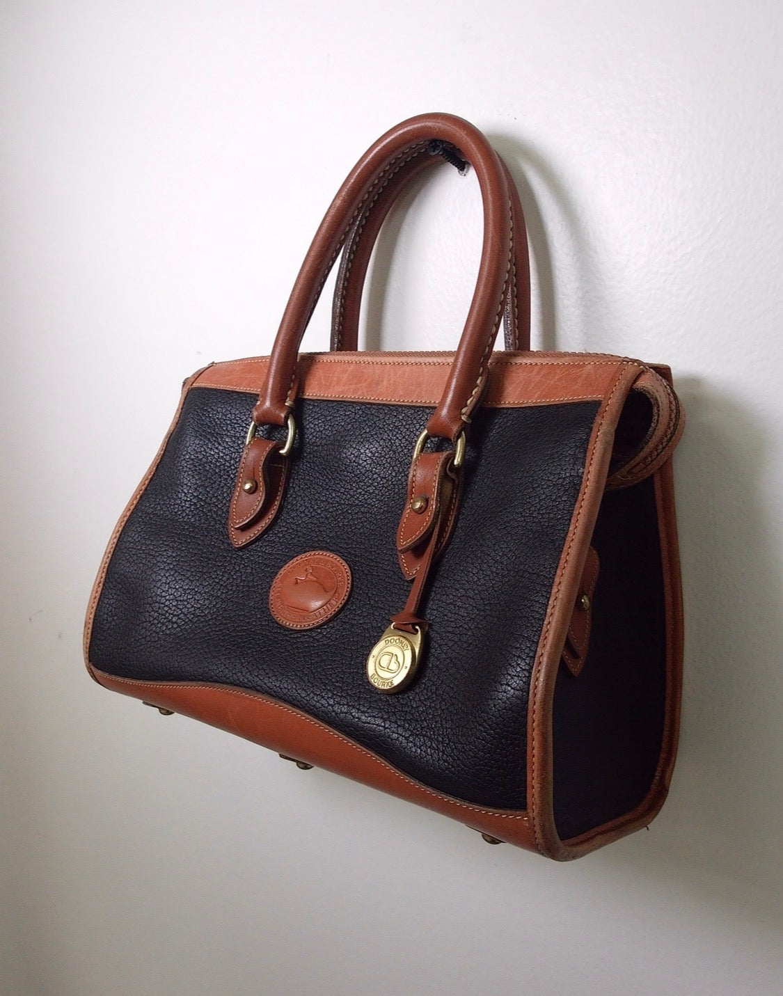 Pre Owned Dooney & Bourke All Weather Leather Satchel | Black & British Tan | Duck Fob (Vintage)