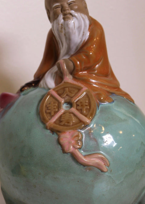 Celadon Glazed Laughing Elder Figure