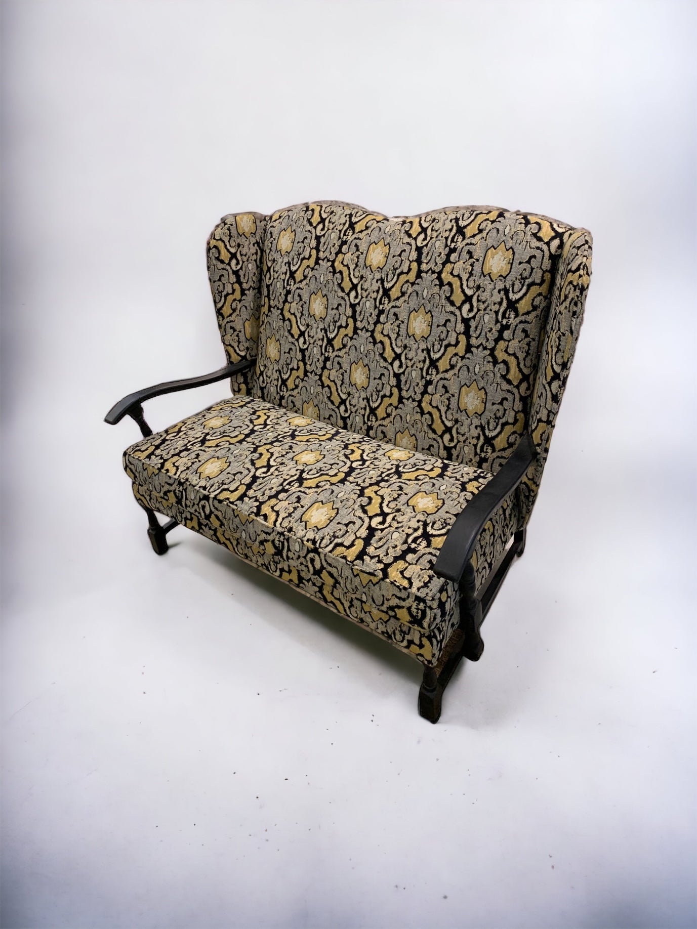 Early 20th Century Wingback Ikat Settee