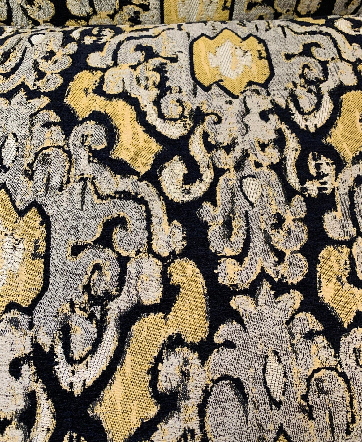 Early 20th Century Wingback Ikat Settee