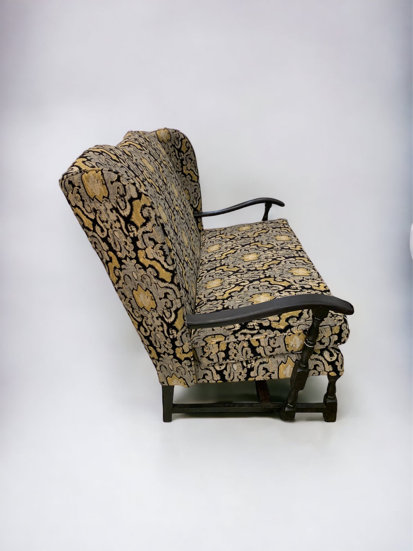 Early 20th Century Wingback Ikat Settee